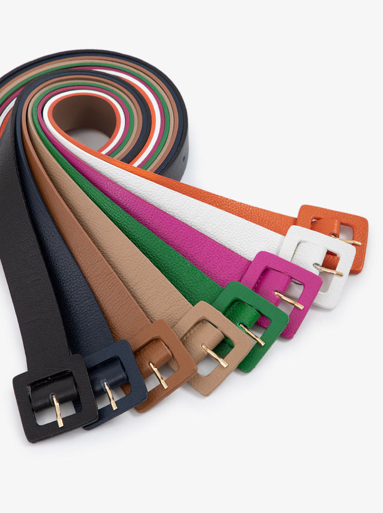 A collection of square buckle belts in various colors, with a metal zamak covered buckle and polyurethane lining.